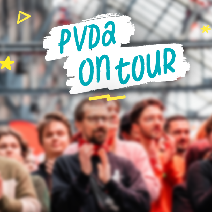 Foto van een groep mensen die applaudisseren.